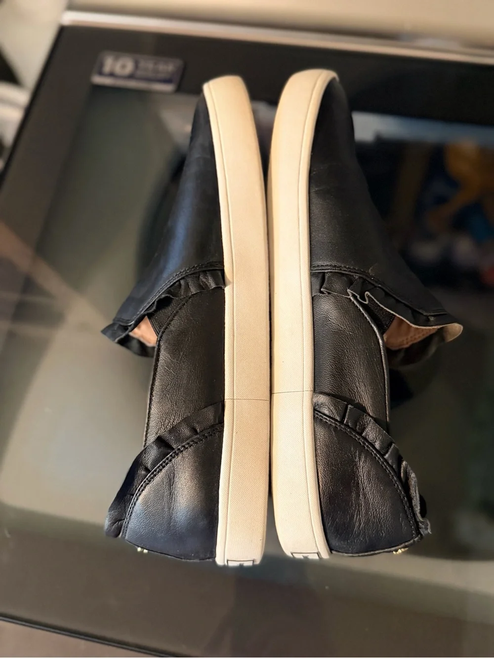 Like new Kate Spade New York Black LeatherSlip On Sneakers women’s size 9.5